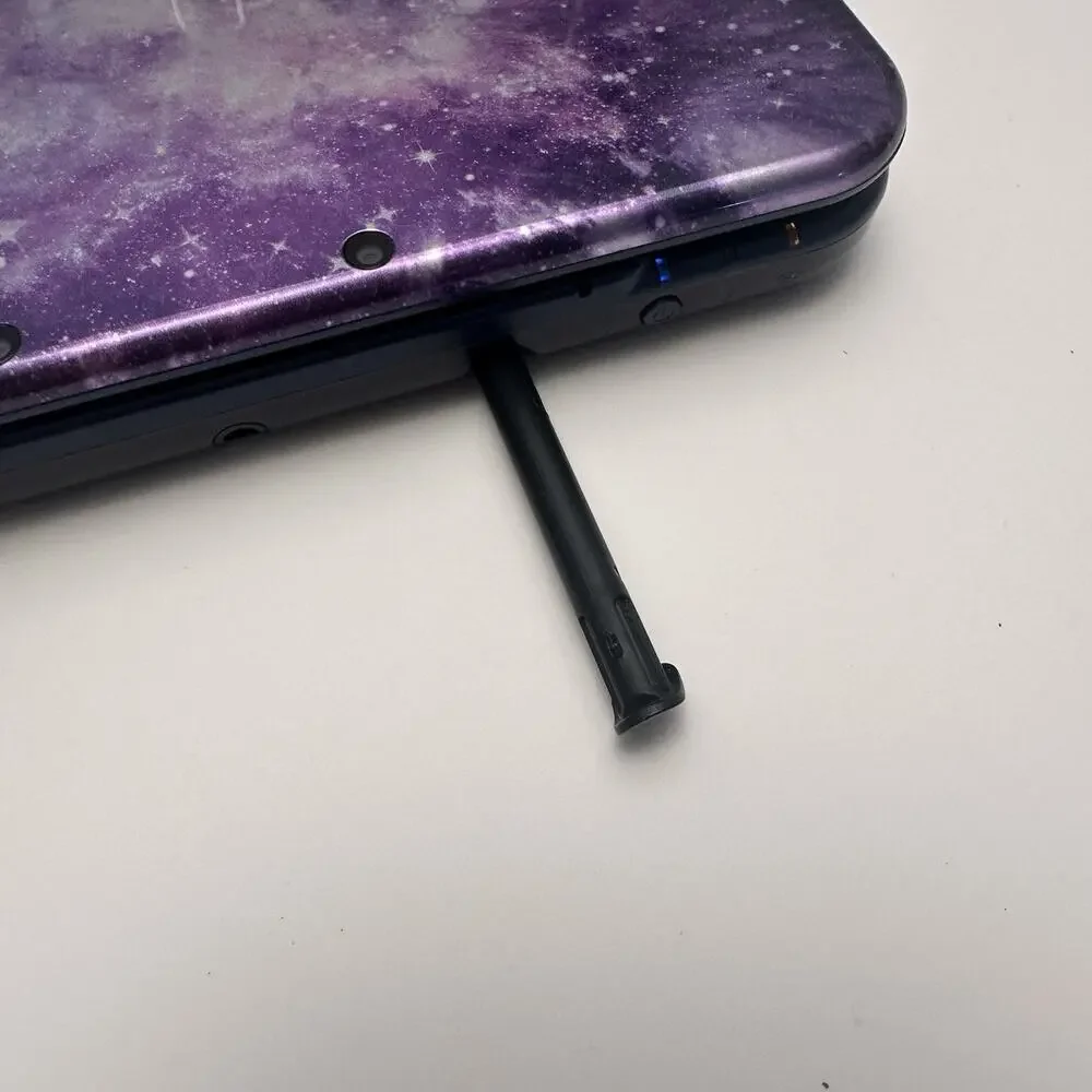 Nintendo New 3DS XL Purple Galaxy Edition - Charger, Stylus, Manual & 4 Games